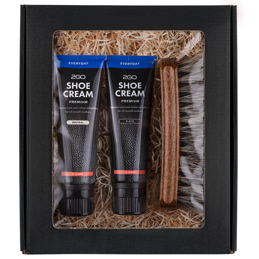 shoe care box with neutral and black shoe cream and brush