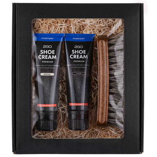 shoe care box with neutral and black shoe cream and brush